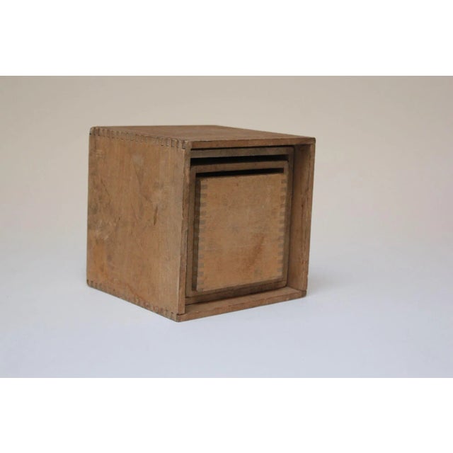 Primitive set of seven blocks and boxes (some four-sided, some two) which nest in the largest box (ca. early 20th Century,...