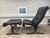 Bring iconic Scandinavian design into your home with this pair of original Siesta Deluxe lounge chairs with matching...