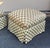 George Smith Run Up Ottomans in green and tan checkered fabric with down cushions on brass ball casters.