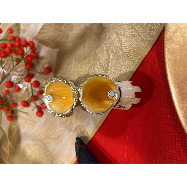 Holiday Boot Trinket Box – Festive Enamel over fine pewter, embedded with hand placed Swarovski Crystals, and a 24k gold...