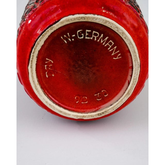 A ceramic vase from mid-20th century Germany. Neither large nor small, this studio made pot reflects the hand-held, and...