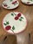 Add a charming touch of mid-century Americana to your tablescape with this vintage set of four bread and butter plates by...