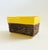 A mid century vintage rectangular ceramic planter. Glossy yellow glaze with a textured brown base. Made in California by...