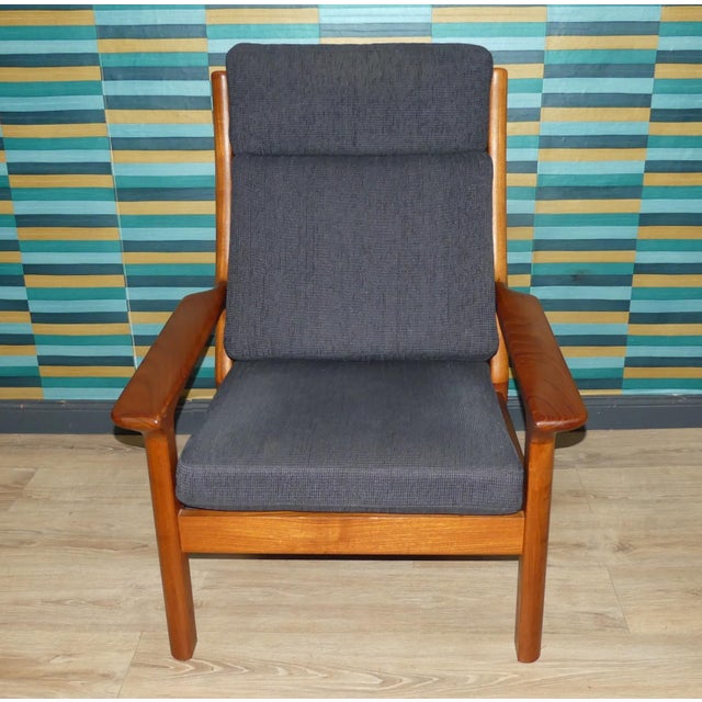 High-quality, sturdy danish design armchair, high-back chair, ideal tv chair design classic of the 60s/70s elegant teak...