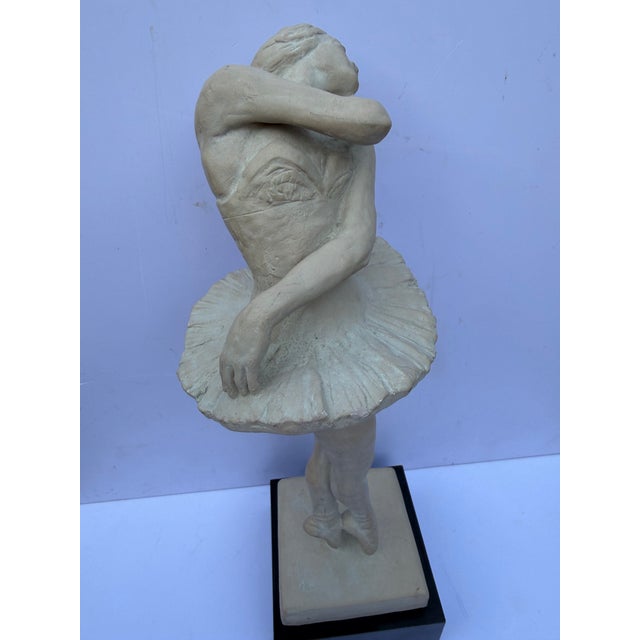 Add a touch of postmodern elegance to your home with this striking vintage 1985 ballerina sculpture titled "On Point"....