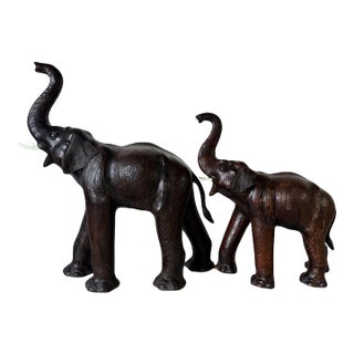 Vintage Safari Style Oversized Leather Elephant Sculptures With Raised Trunks – A Pair For Sale