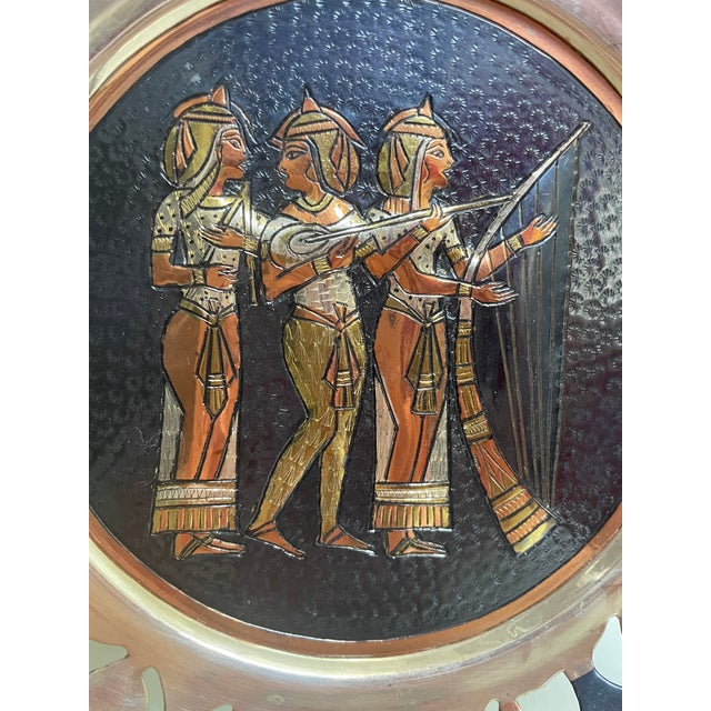 This Vintage Egyptian Wall Decor plate is handcrafted using Brass, Copper and Silver inlays and features a famous scene...