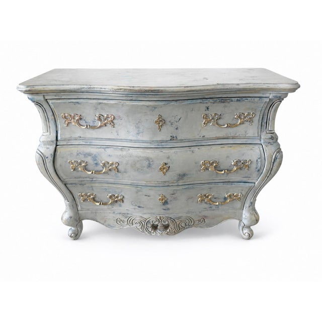A breathtaking one-of-a-kind bombe chest, hand-painted and artistically transformed by Maison Martine, a boutique atelier...