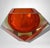 A substantial and distinctive Murano glass ashtray characterized by a bold, sculptural profile with sharply cut edges and...