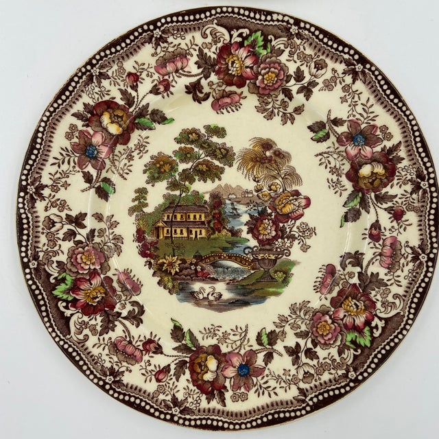A charming pair of vintage English transferware plates in the beloved Tonquin pattern by Clarice Cliff for Royal...