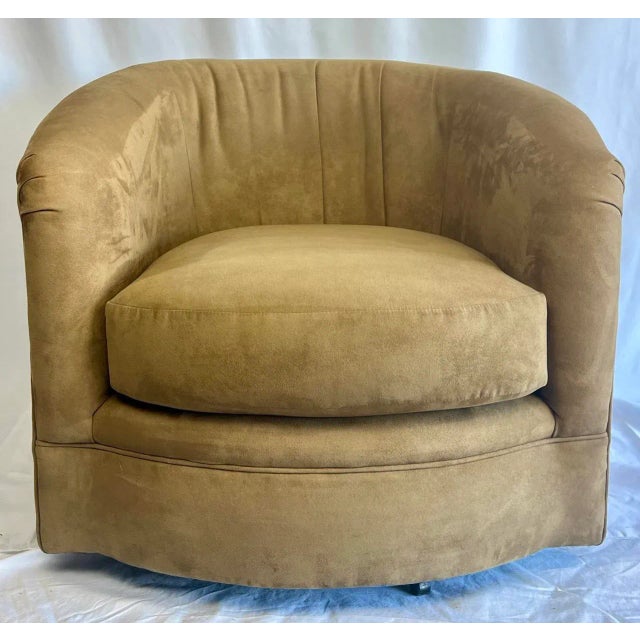 Mid Century style, Swivel Barrel chair upholstered in light brown microsuede. Reminiscent of Milo Baughman's work. Very...