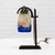 French Art Deco table lamp, signed Degué (David Guéron), made circa 1930. The lamp stands on a characterful wrought iron...