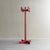 This postmodern coat hanger is constructed from red-stained pine wood, showcasing a bold, architectural silhouette...