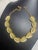 MCM choker necklace by BSK is designed with articulated leaf-shaped links in a warm, textured gold-tone finish. Each...