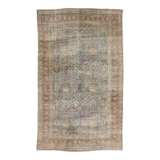 Antique Mashad Wool Rug With Allover Palmette Motifs & Muted Blue Patina For Sale
