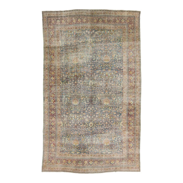 Antique Mashad Wool Rug With Allover Palmette Motifs & Muted Blue Patina For Sale