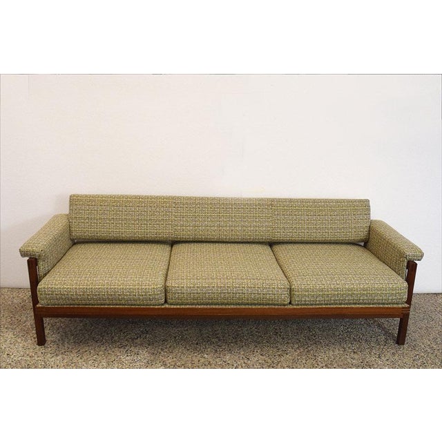 Sofa bed of Scandinavian production of the 1960s. Rosewood structure with base, padding and fabric completely restored,...