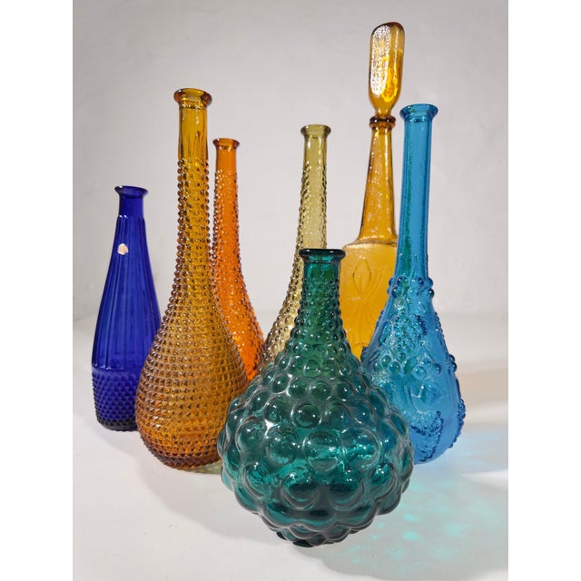 A set of seven Genie bottles made in the heart of Tuscany, where the Arno River winds past ancient stone workshops, lies...