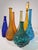 A set of seven Genie bottles made in the heart of Tuscany, where the Arno River winds past ancient stone workshops, lies...