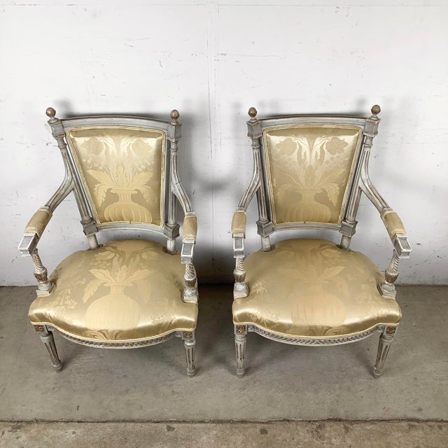 This elegant pair of Louis XVI–style armchairs reflects the refined symmetry and architectural discipline that define...