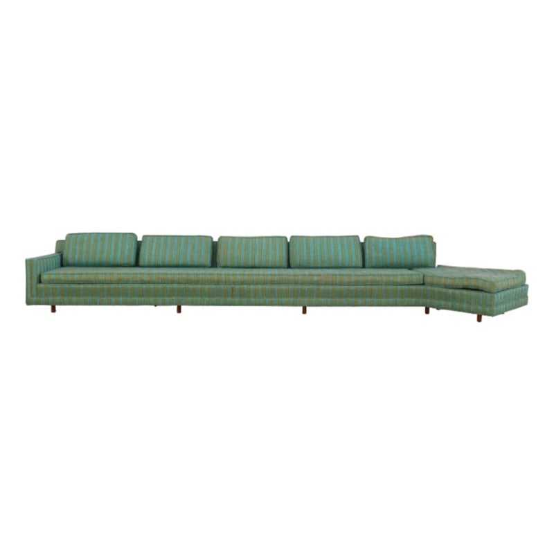 Green plaid sectional sofa with chaise lounge