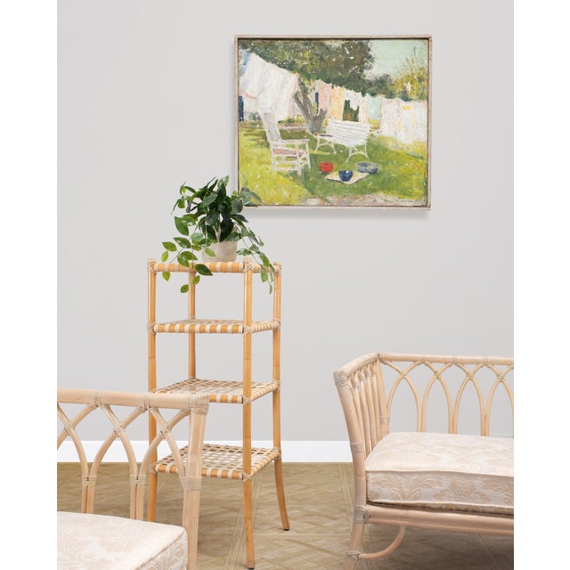 A charming mid-20th century impressionist style oil on canvas painting depicting a laundry line in a backyard on a summer...