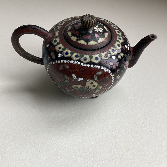 Antique miniature Japanese cloisonné enamel teapot from the Meiji period. Brass base with enamel and wire work detailing...