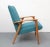 This 1950s armchair in Scandinavian style has a construction of light ash.