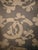 Chanel large silk chiffon scarf This charming scarf features four-leaf clovers and four large "CC" logos in shades of...
