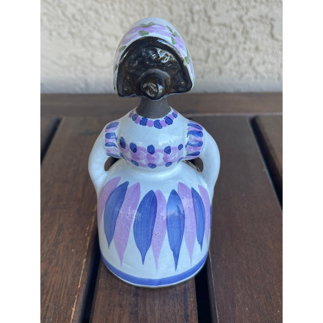 This is a Deco Helsingborg ceramic girl bud vase from Sweden, dating back to the 1960s. Hand-painted with purple and blue...