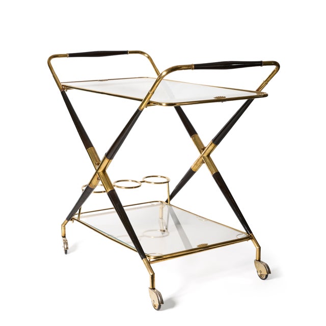1950s Italian bar cart in style of Cesare Lacca. Mid-century chic, modern style and pure elegance in wood, brass and...