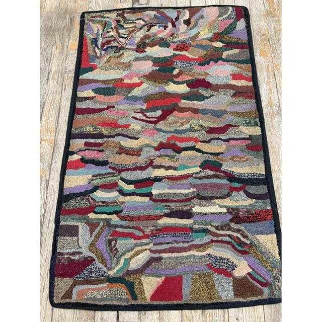 This is a delightful and highly authentic small antique American Hooked accent rug, dating back to circa 1880. Measuring a...