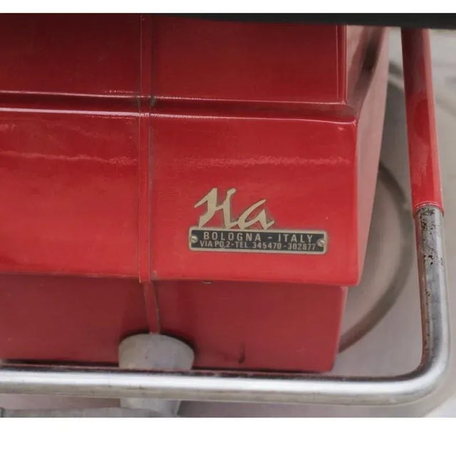 Barber chair by the company “HA” of Bologna, made in the 1980s, rotates 360 degrees, seat raises and lowers, has an...