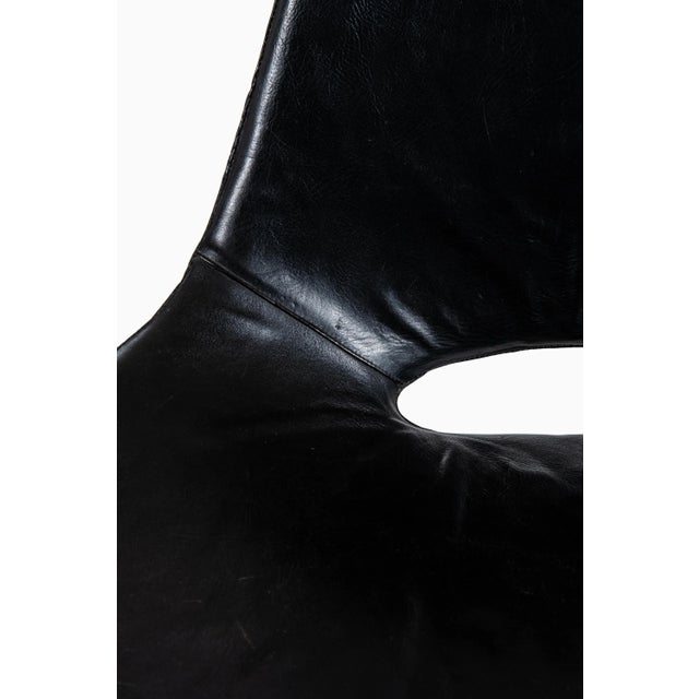 Rare easy chair model scimitar designed by preben fabricius & jørgen kastholm produced by ivan schlecter in denmark steel...