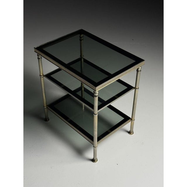 Set of 2 vintage side tables from the 1960s-70s. Originating from France. Slightly different in color. One has a somewhat...