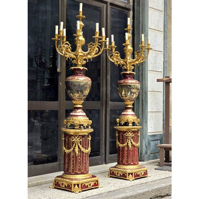 Create an extraordinary focal point with this matching pair of grand French-style decorative pedestal sets, each combining...