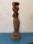 A terracotta figure depicting a maidservant from the 15th-century Majapahit Empire. These figures were often kept in homes...