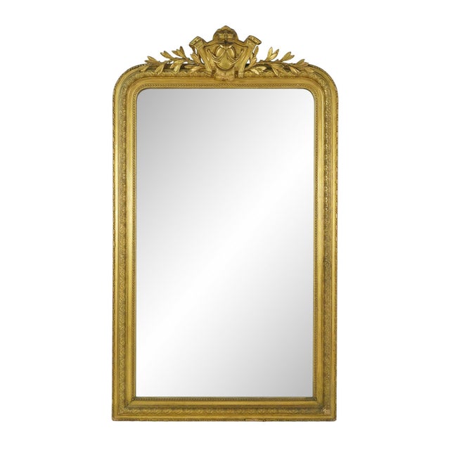Antique French made Louis Philippe giltwood mirror dating to around the mid to late 19th century. It features the rounded...