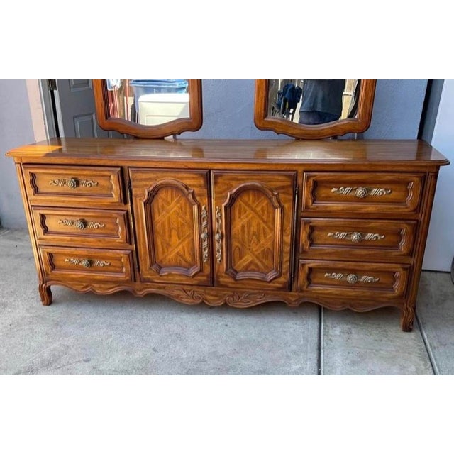 This dresser is a true vintage classic. Drexel Heritage furniture is known for its luxurious look and timeless design....