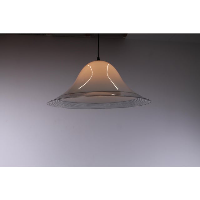 Italian style large plastic hanging lamp (w 56 cm). Attractive biomorphic, soft looking acrylic shade with transparant...