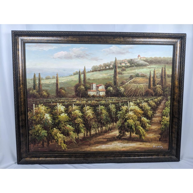 An impressive monumental-scale signed oil painting depicting a sweeping Tuscan-style vineyard landscape, richly composed...