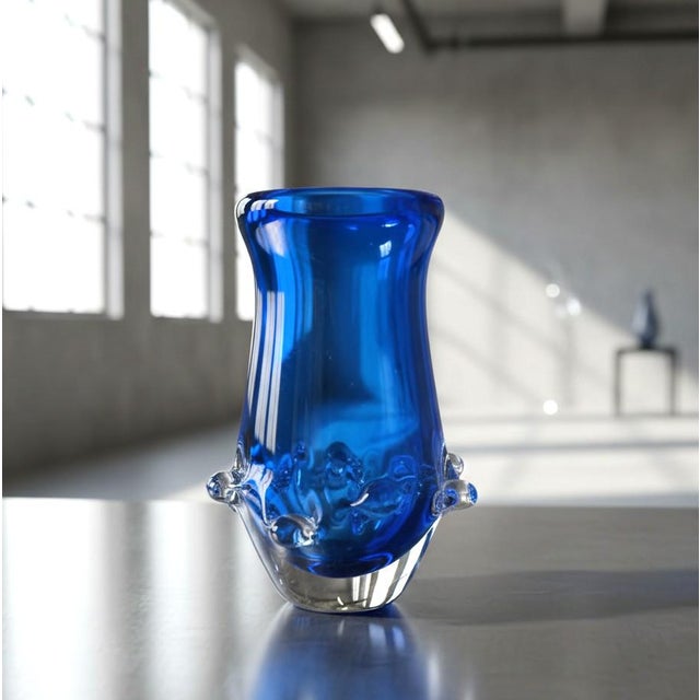This distinctive vintage art glass vase by Ladislav Paleček showcases the innovative character of Czech glassmaking....