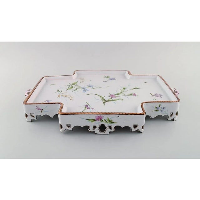 Emile Gallé for St. Clement, Nancy. Large serving tray with handles. Hand-painted faience with flowers and butterflies....