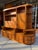 4 separate units, stand alone, or modular to fit your needs. Teak throughout all pieces. Outer cabinets are corner pieces....