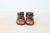 A charming pair of mid-century bronzed baby shoes, preserved in warm copper tones with softly aged patina. Life-size...