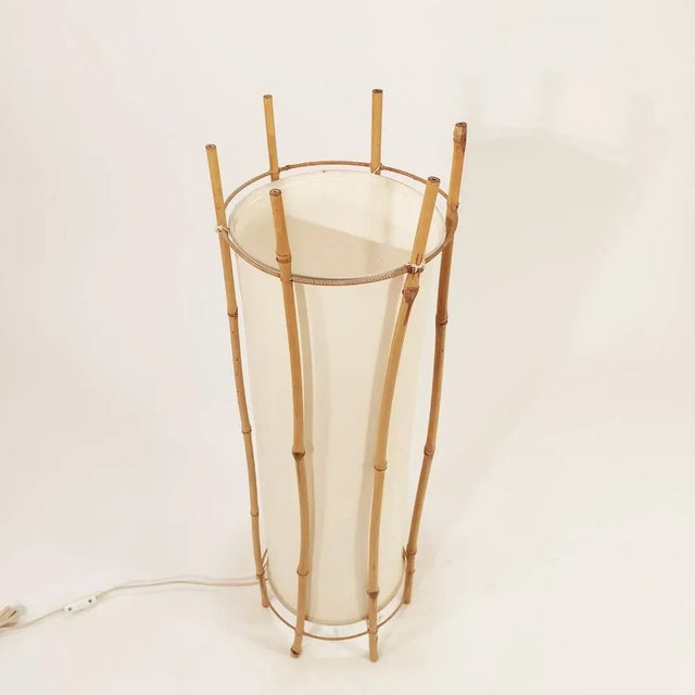 Floor or table lamp designed by the French architect Louis Sognot and manufactured in Italy in the 1960s. The structure is...