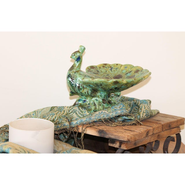 If you love the 60s and 70s, this is your bowl! Made of ceramic and painted in hues of blue and green, this bowl is in...
