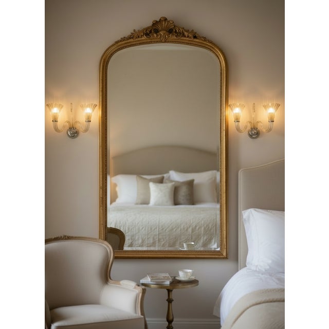 This elegant pair of mid-century modern wall sconces showcases the exceptional craftsmanship of mid-20th-century Venetian...