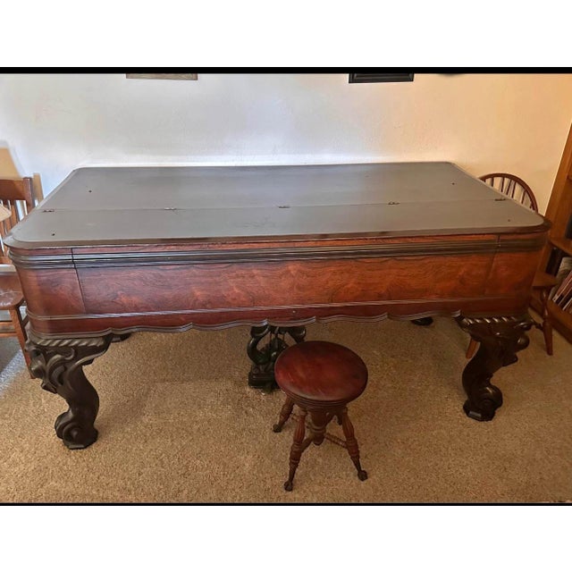 A magnificent restored Victorian antique square grand piano of exceptional presence and craftsmanship. This rare...