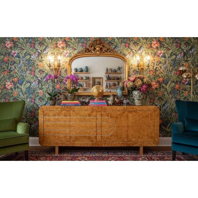 Discover the epitome of mid-century modern elegance with the Vladimir Kagan Attributed Sideboard in Burlwood with Brass...